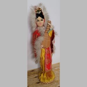 Vintage Chinese Doll on Wood Base